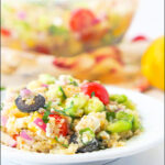 bowl of zucchini quinoa salad and text