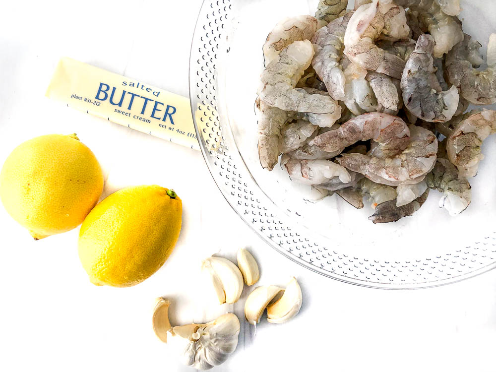 recipe ingredients - butter, lemons, garlic and shrimp