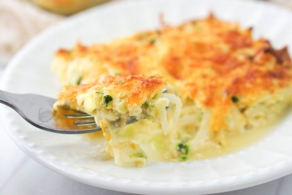 a forkful of cheesy zucchini dish