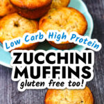 Closeup of a low carb zucchini protein muffin with a blue plate in the background and text overlay.
