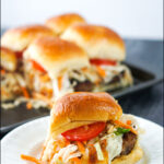 pan and white dish with primate sausage sliders and text