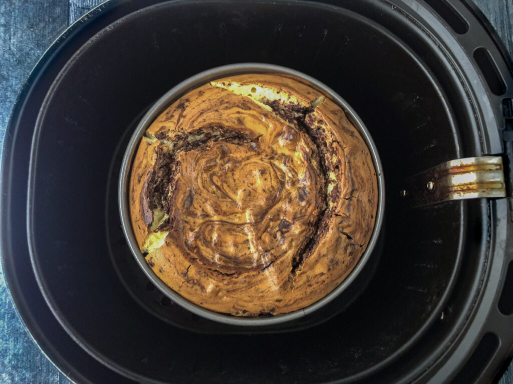 air fryer basket with baked brownie batter keto cheesecake