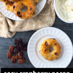 white plates with cranberry pecan air fryer bagels and text