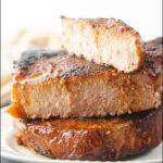 stack of smoked pork chops with text