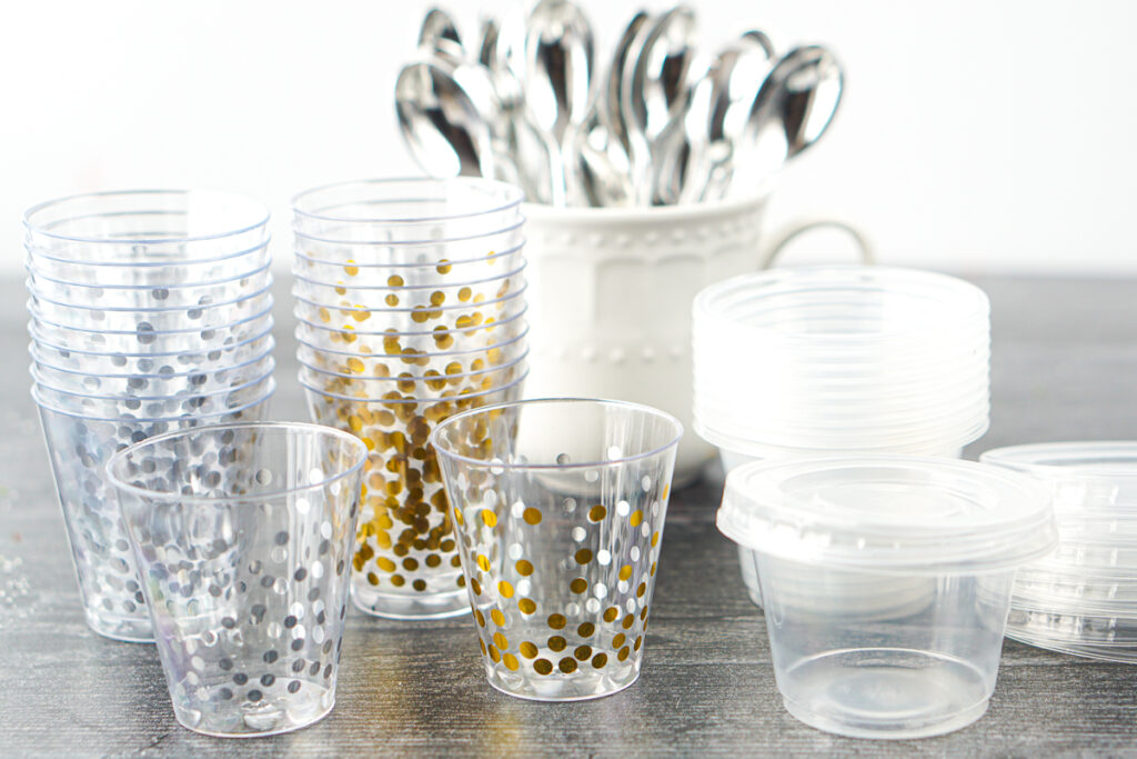 The dollar store array of pretty plastic shot glasses and containers and mini spoons