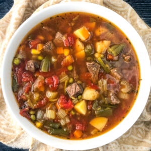 white bowl with instant pot beef vegetable soup
