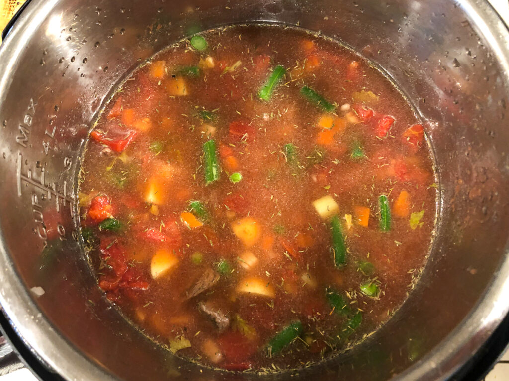 instant pot with soup ready to cook