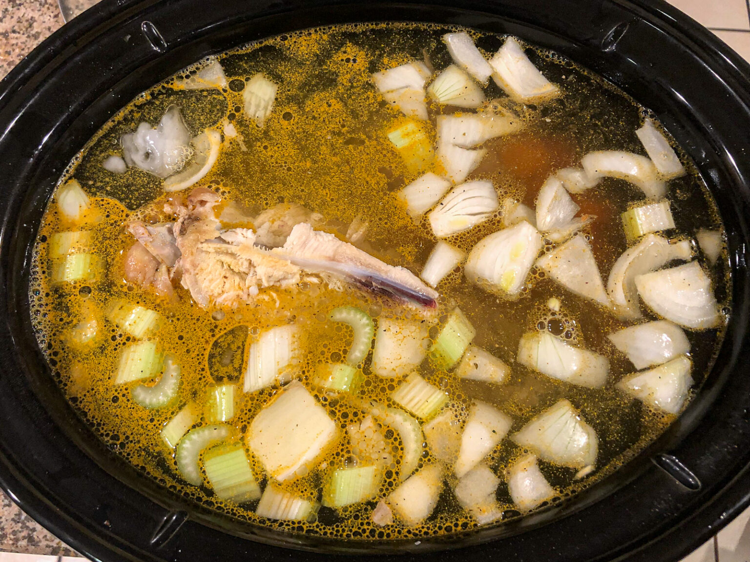 Slow Cooker Chicken Bone Broth Recipe easy healthy homemade broth!