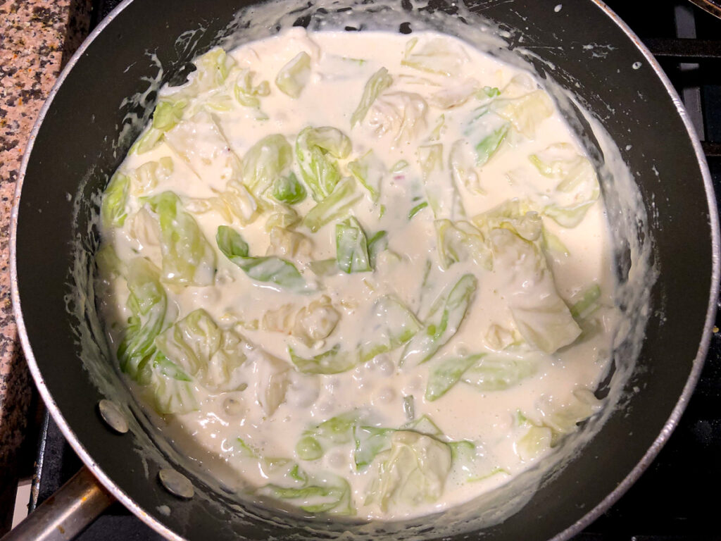 pan with cabbage noodles and creamy Parmesan sauce