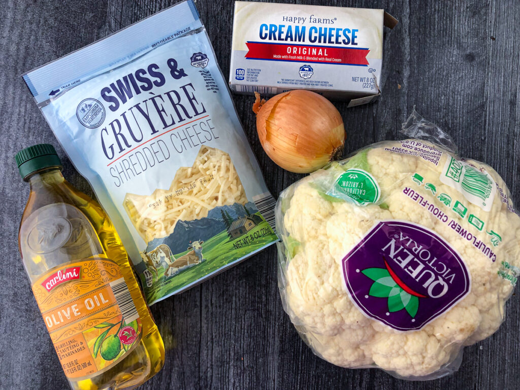 recipe ingredients - head of cauliflower, olive oil, Swiss gruyere shredded cheese, onion and cream cheese