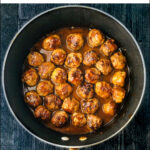 aerial view of a pan with keto bbq meatballs with text