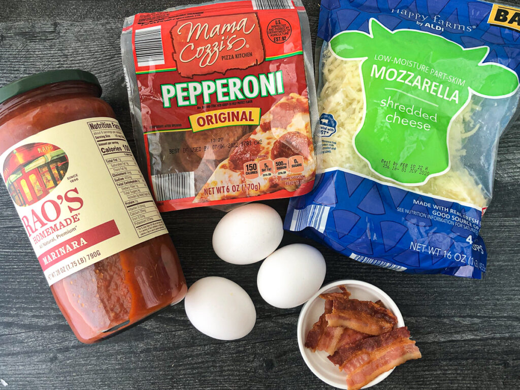 egg pepperoni pizza skillet ingredients - sauce, cheese, pepperoni, eggs and bacon