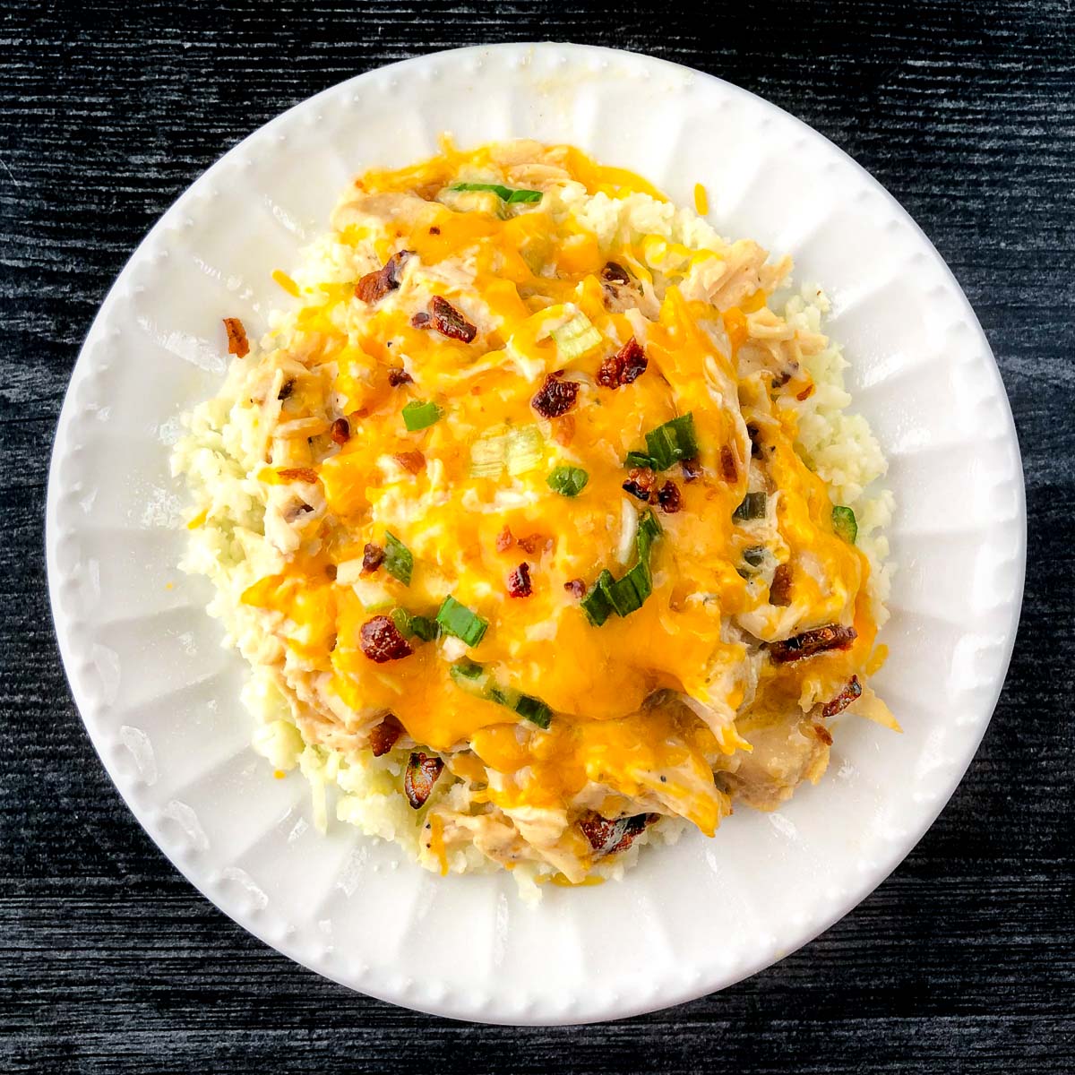 white plate with slow cooker keto chicken bacon ranch casserole