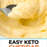 closeup of a spoonful of keto cheddar mashed cauliflower with text