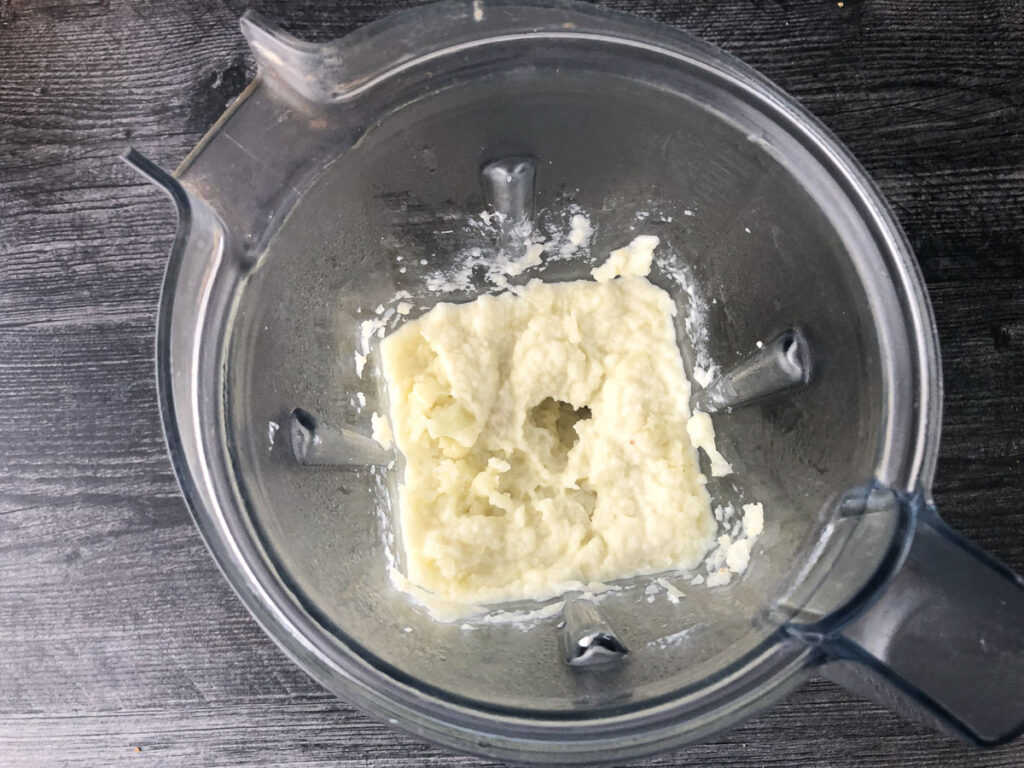 blender pitcher with cauliflower and cream cheese mixture