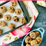 aerial view of cookies on a baking sheet and blue bowl with granola cookies with text