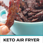 blue bowl with keto beef jerky made in air fryer with text