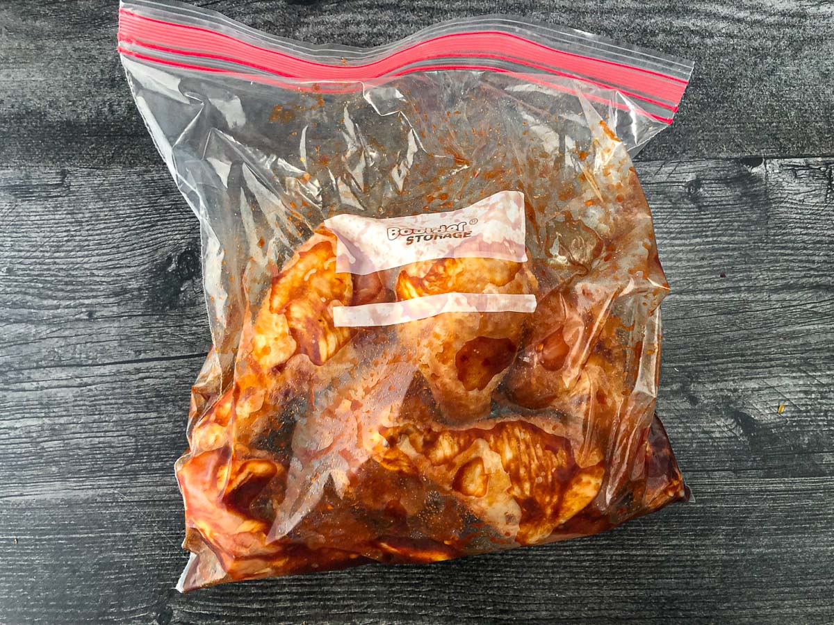 baggie with marinated chicken legs