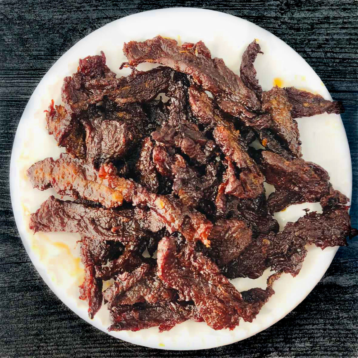 white plate with air fryer beef jerky