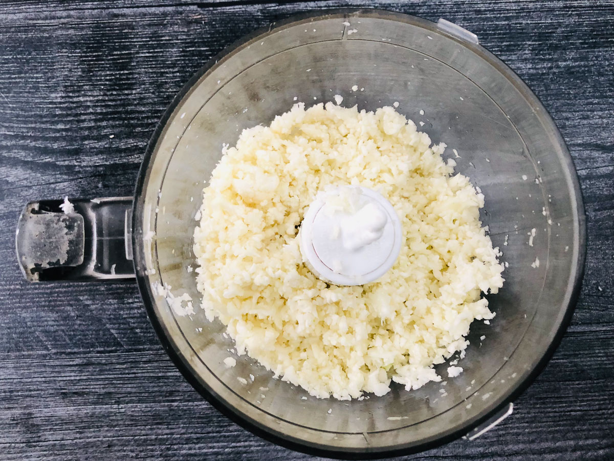 food processor with minced cauliflower rice