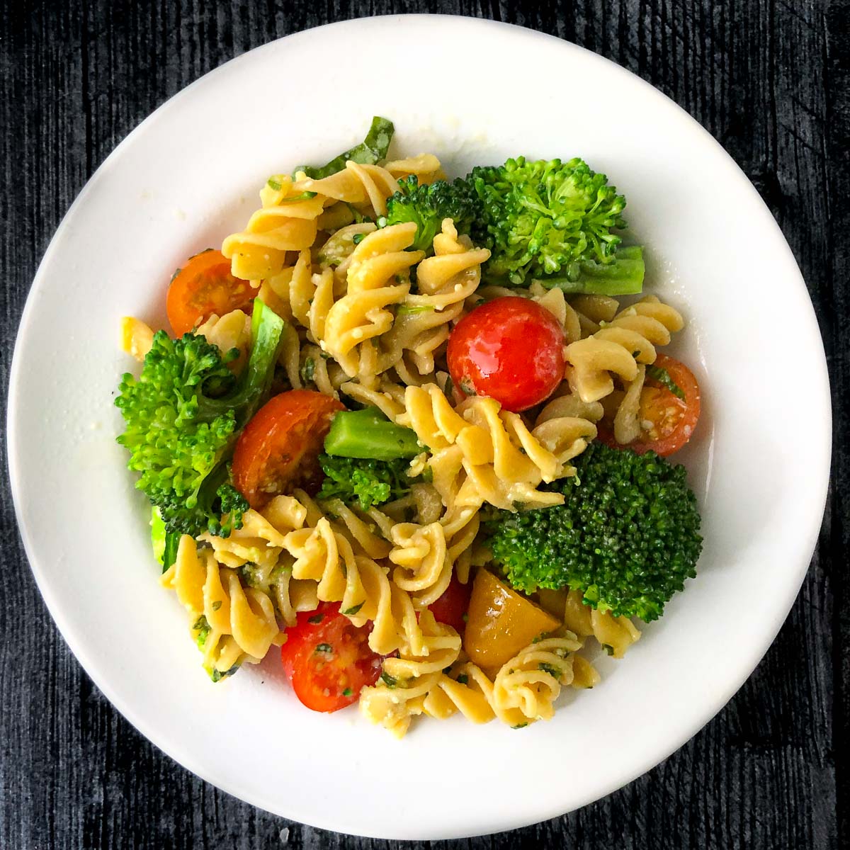 broccoli pasta salad on a white plate