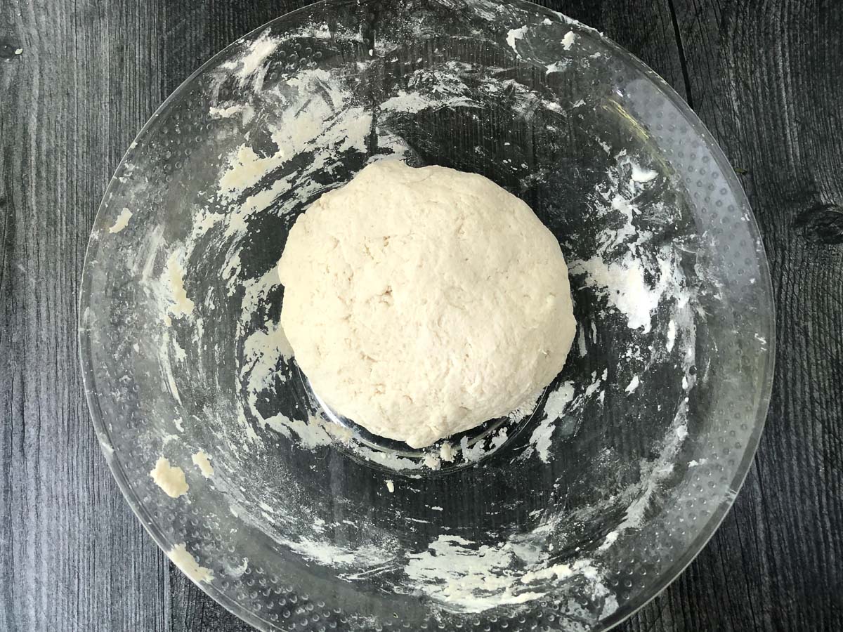 glass bowl with 2 ingredient pizza dough ball