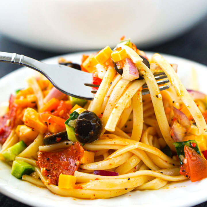a forkful of linguine salad using salad supreme