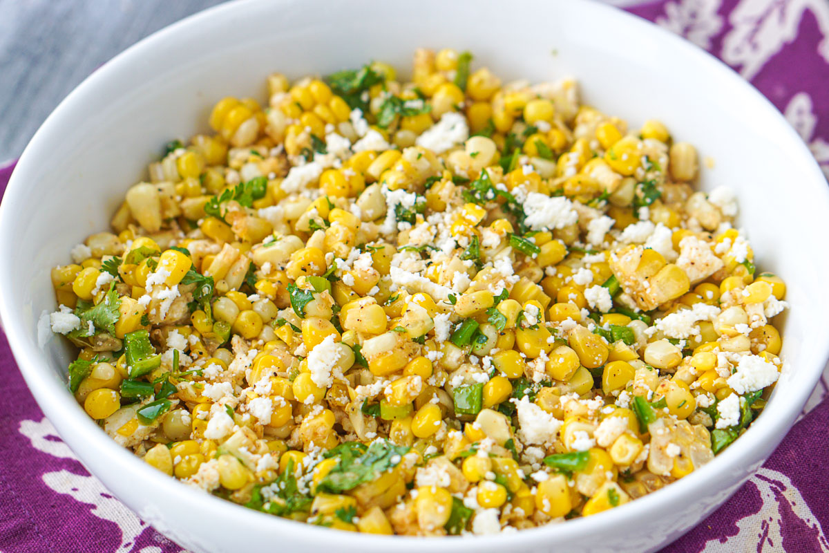closeup of a bowl of leftover corn salad