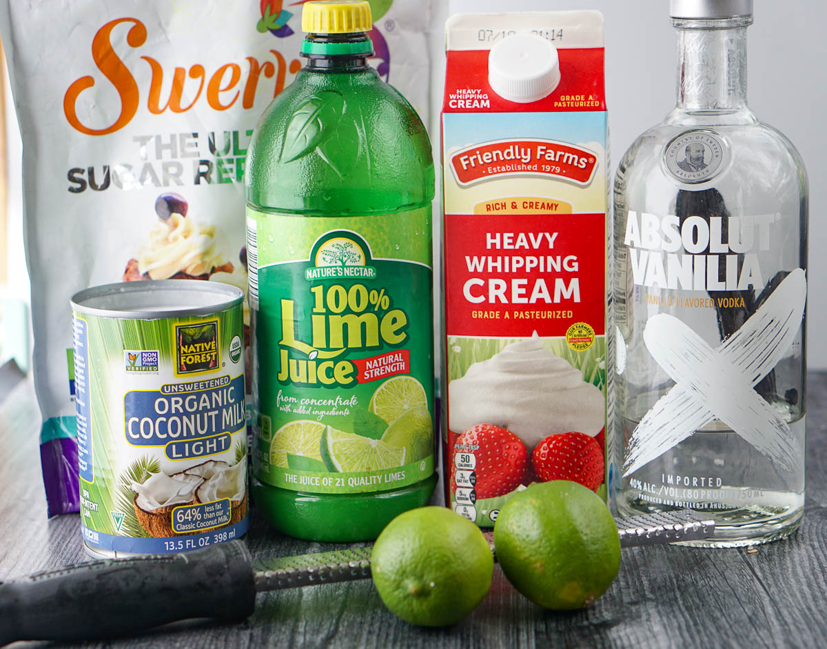 ingredients to make keto cocktail - Swerve sweetener, heavy cream, absolut vanilla, coconut milk, lime juice and limes