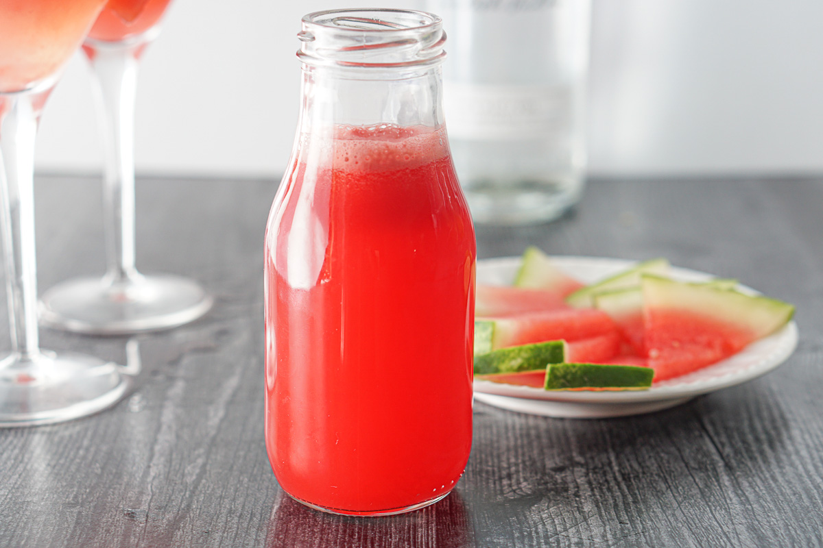 glass bottle with watermelon juice