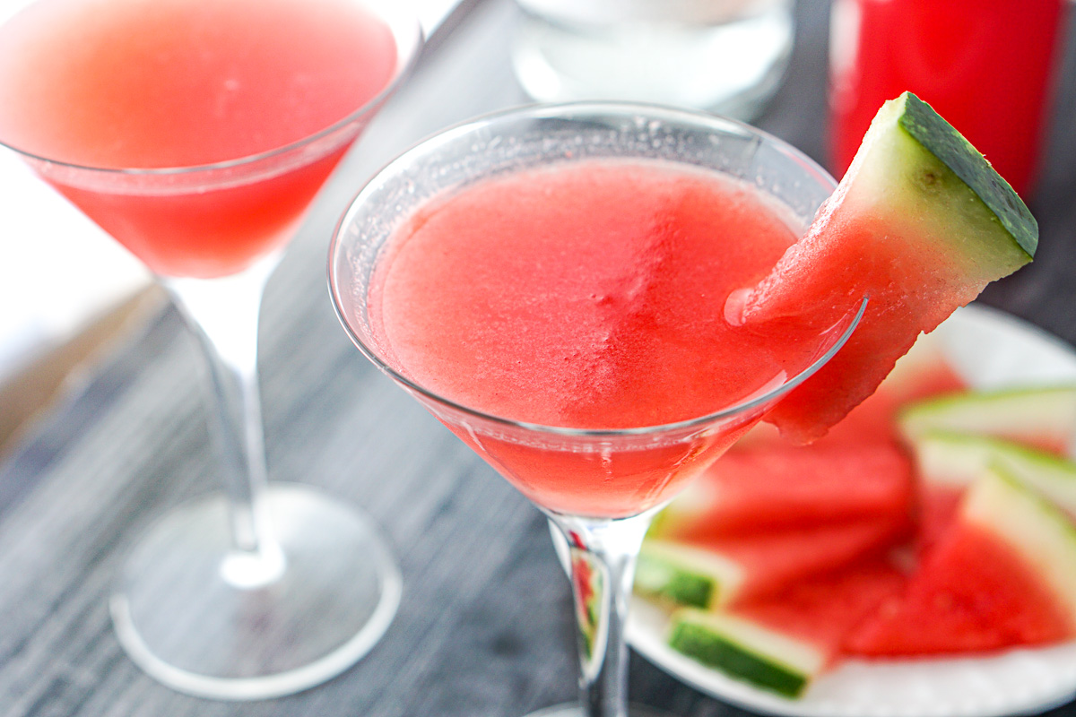 closeup of martini glasses with cosmo cocktail