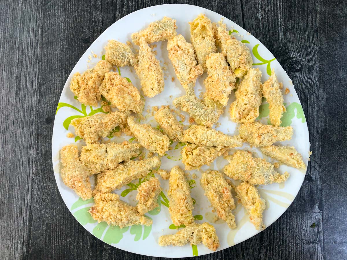 plate with artichokes in keto breading