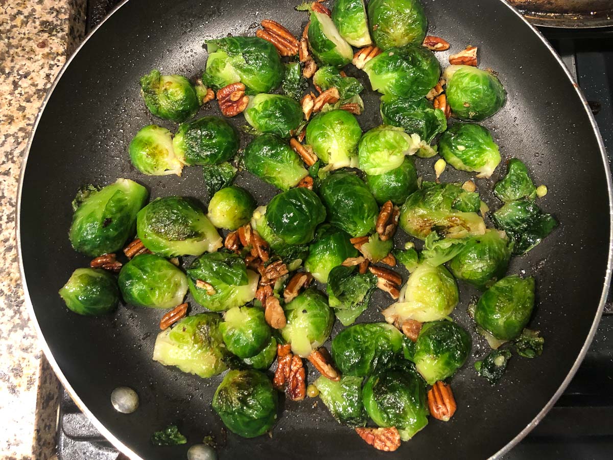 pan with Brussels and pecans