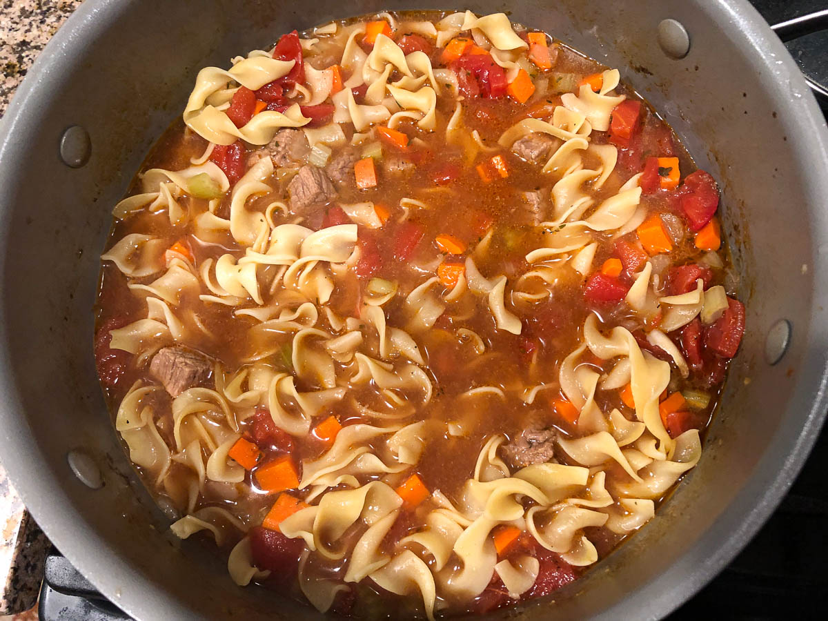 soup pot with noodles at the end of making