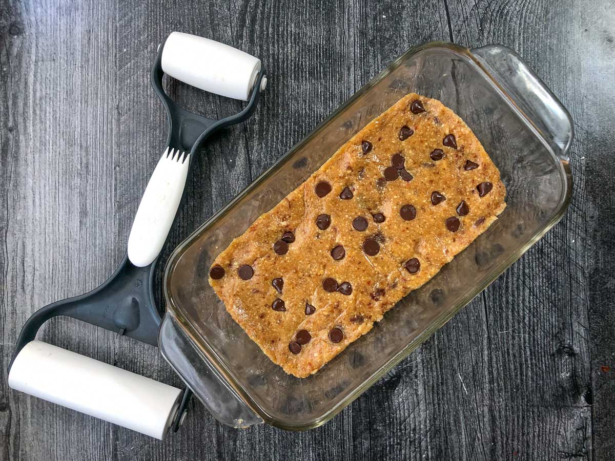 bread pan with nobake Larabars batter and mini rolling pin