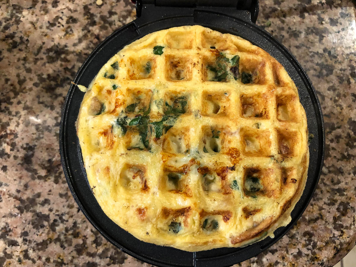 waffle maker with finished omelet