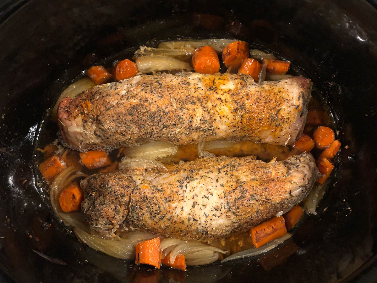 finished pork tenderloin in the slow cooker