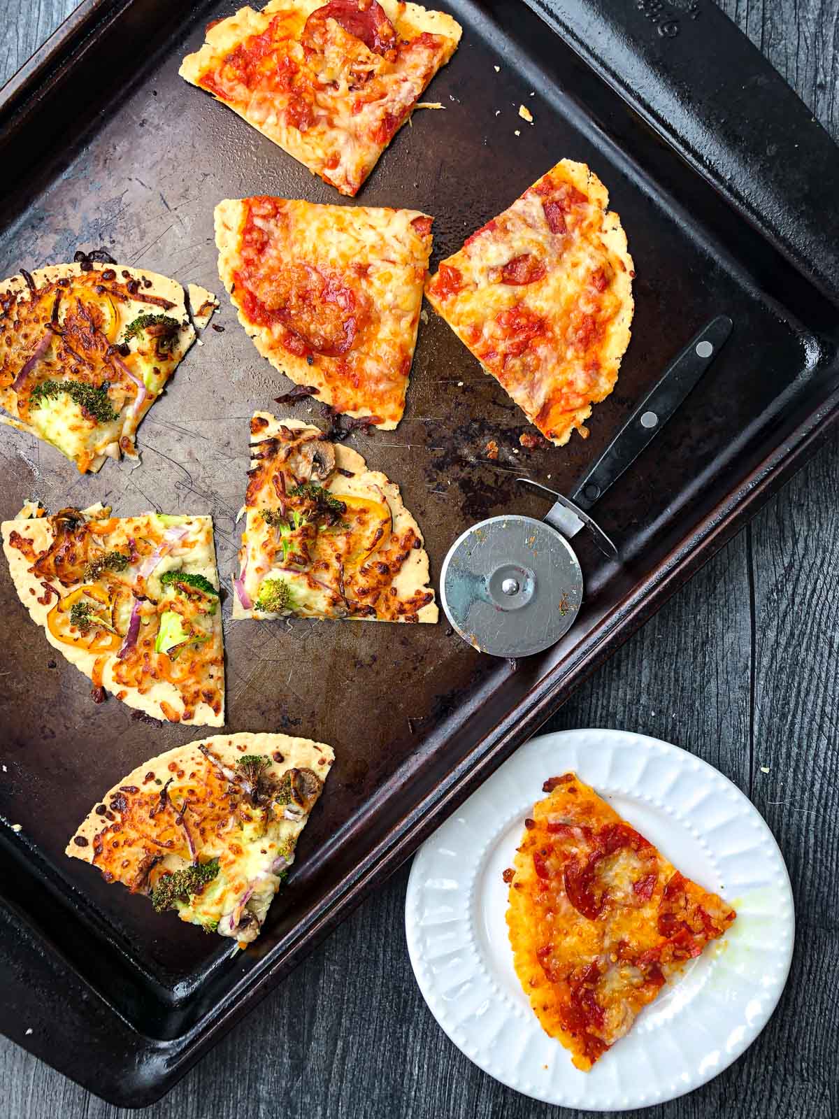 aerial view of baking sheet with tortilla pizza