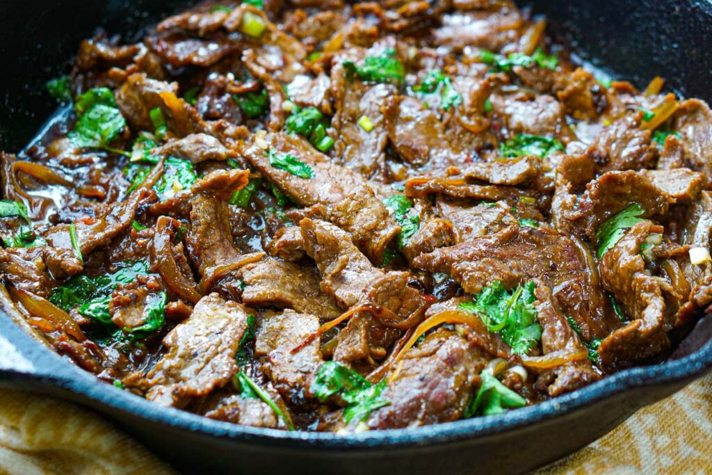Spicy Flank Steak Stir Fry Recipe flavorful, tender and crispy beef slices.