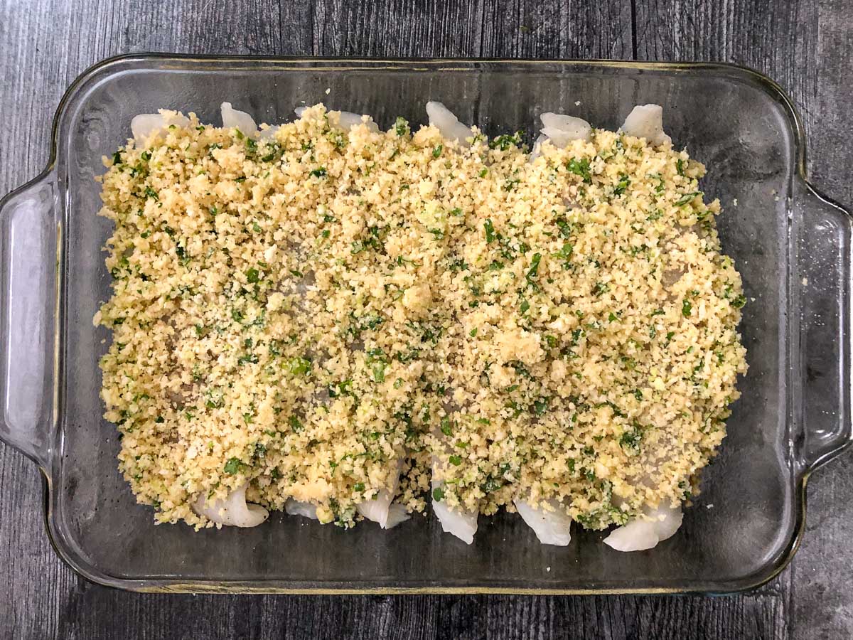 baking dish with the panko crusted tilapia ready to bake