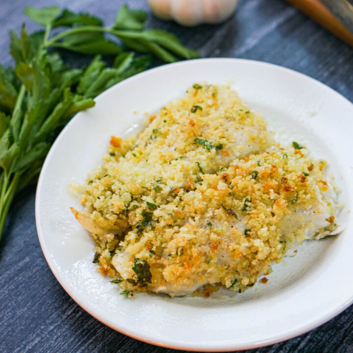 white plate with panko crusted tilapia bake