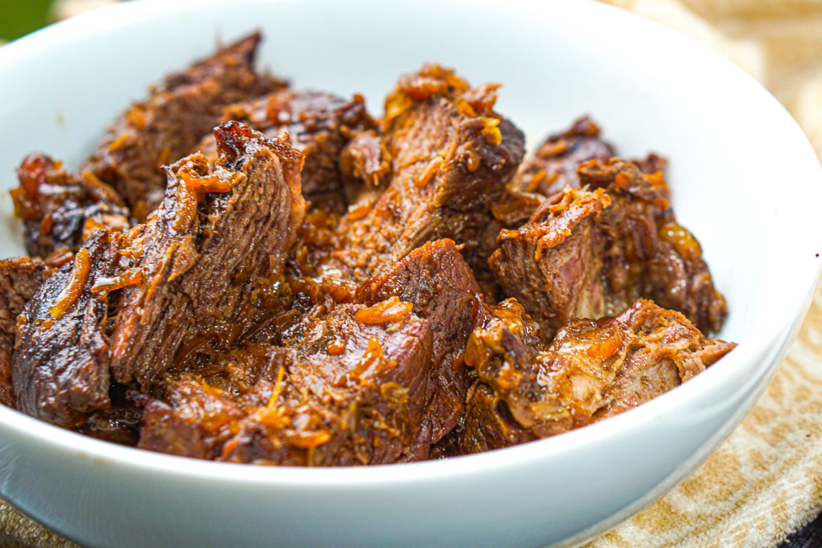 closeup of  white bowl with onion soup mix pot roast