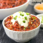 white bowls with chili and toppings with text