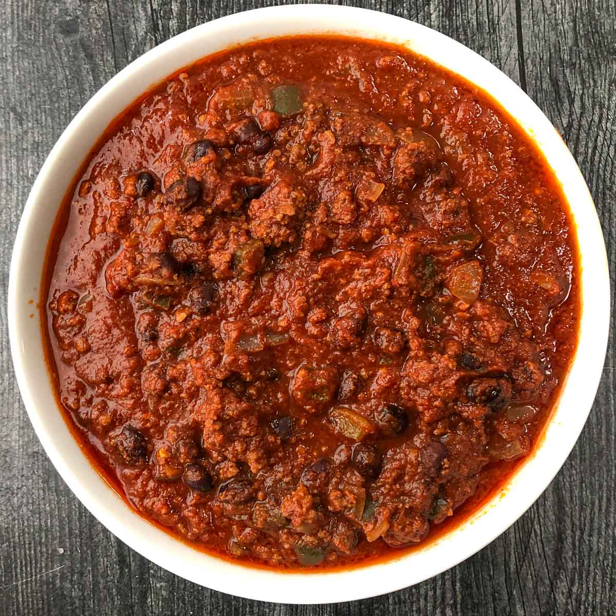 white bowl with slow cooker chili