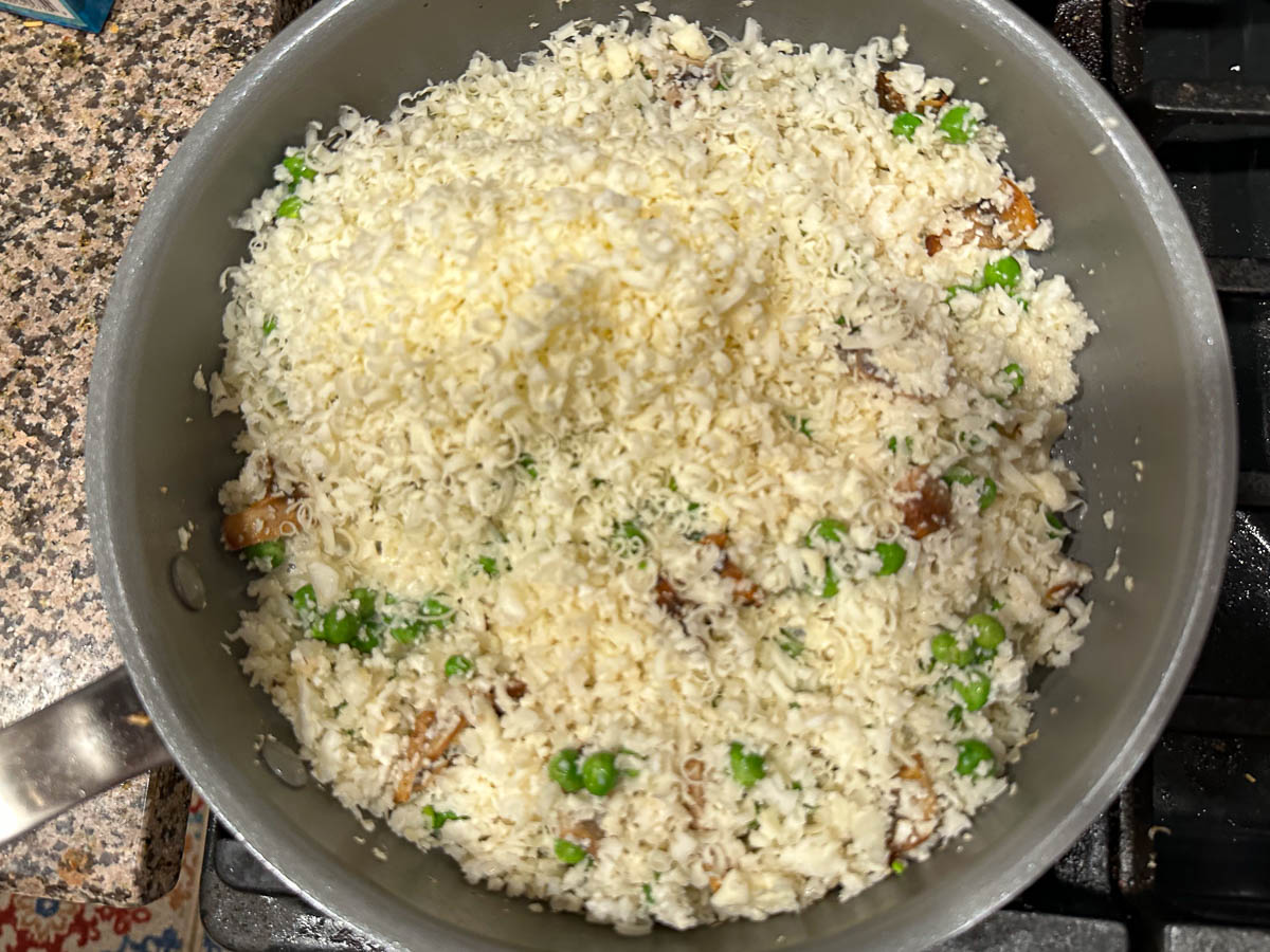 pan with cauliflower rice mixture and asiago cheese