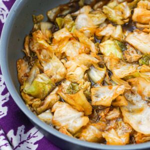 skillet with keto spicy stir fried cabbage