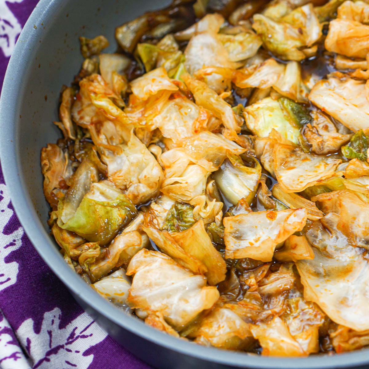 skillet with keto spicy stir fried cabbage