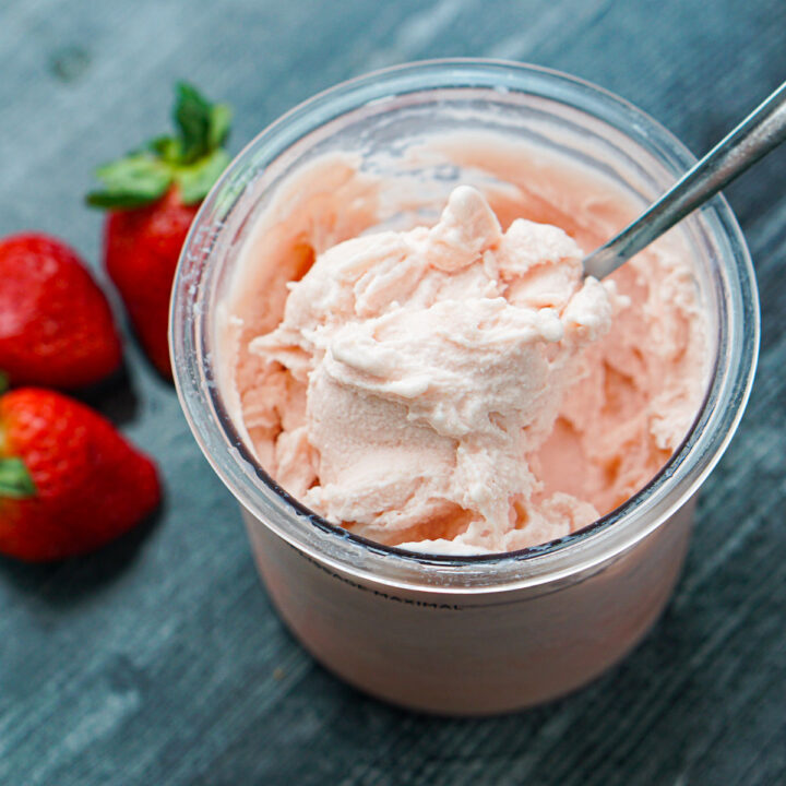 Ninja Creami container with keto strawberry protein ice cream