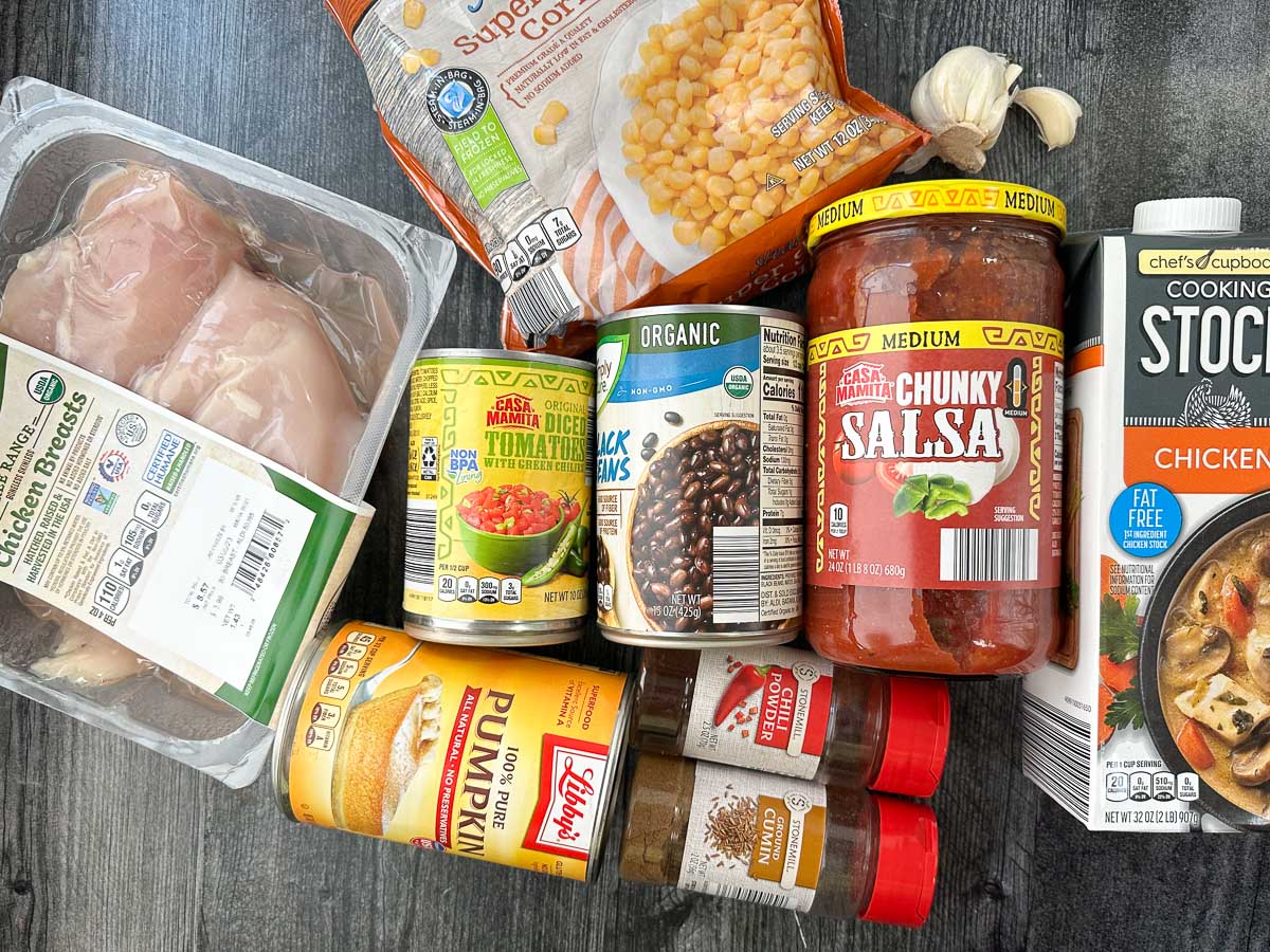 recipe ingredients - chicken breast, chicken broth, salsa, corn, beans, pumpkin, spices