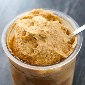 closeup of container of keto coffee ice cream with spoon